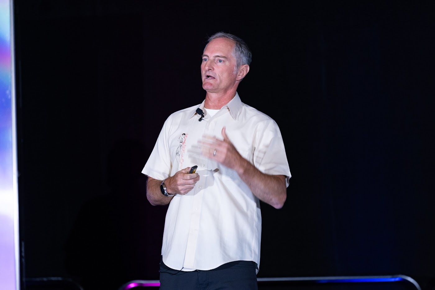 Kent Lewis speaking at an industry event